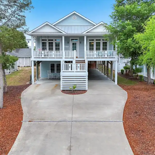 SPACIOUS, STYLISH, AND STEPS FROM THE SAND — THIS FURNISHED OAK ISLAND GEM HAS IT ALL!