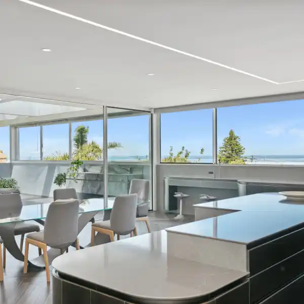 UNSURPASSED SIX BEDROOM HOME STEPS TO THE BEACH