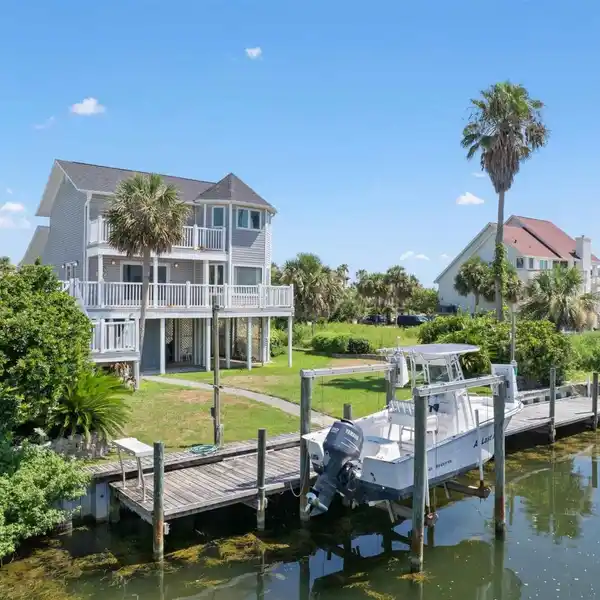 COASTAL RETREAT IN SOUGHT-AFTER LAFITTE COVE