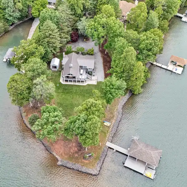 BEAUTIFUL LAKEFRONT HOME ON A POINT LOT