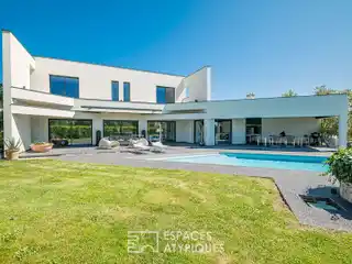 Architectural Gem with Expansive Landscaped Grounds