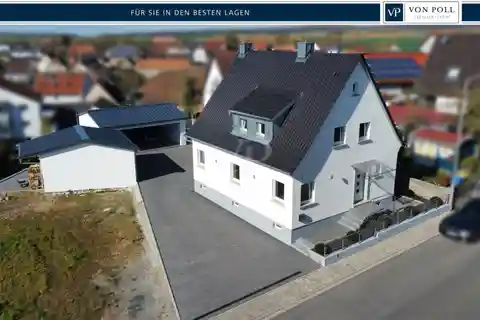 Renovated House with Three Garages Plus Extra Building Plot