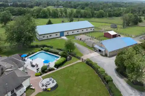Nearly 11-Acre Equestrian Facility with Updated Cottage-Style Home