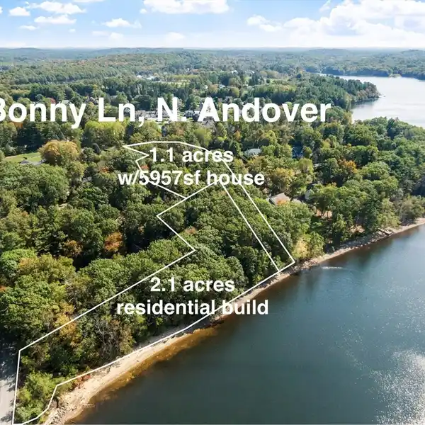 SPRAWLING CONTEMPORARY RESIDENCE WITH PRIME LAKEFRONT