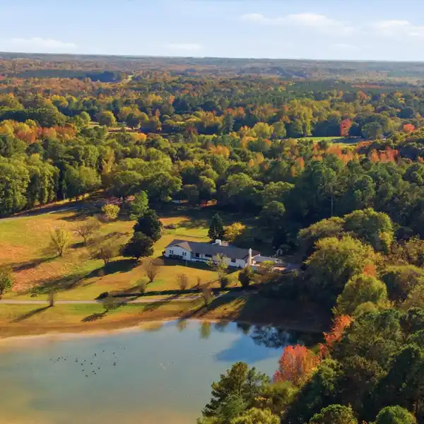 SOUTHERN CHARM MEETS LUXURY ON STOCKED POND