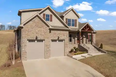 Custom Home in the Prestigious Olde Stone Golf Course Community