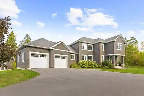 Immaculate Custom-Built Home on a 1.78 Acre Private Wooded Lot