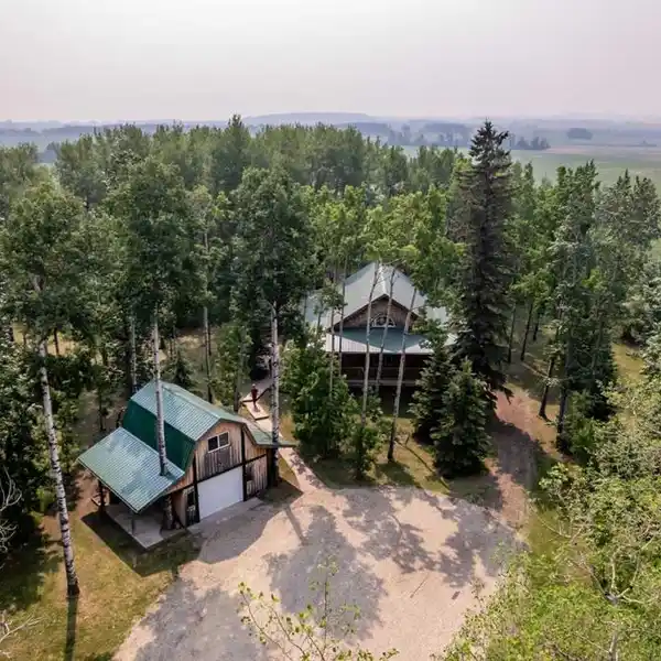 RUSTIC BUNGALOW ON 152 ORGANIC ACRES