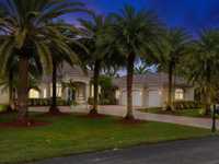 CUSTOM HOME ON A CORNER LOT IN EXCLUSIVE CRYSTAL GROVES ESTATES