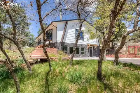 Immaculate Walkout Rancher on over Two Acres