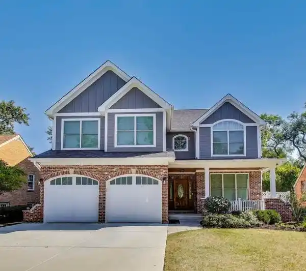 FOUR-LEVEL ELEGANCE WITH DESIGNER FINISHES THROUGHOUT