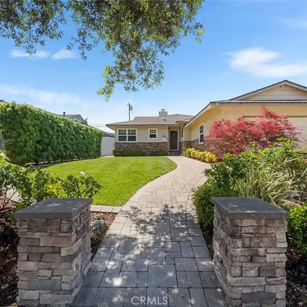 ENTERTAINER’S DREAM WITH LUSH BACKYARD OASIS