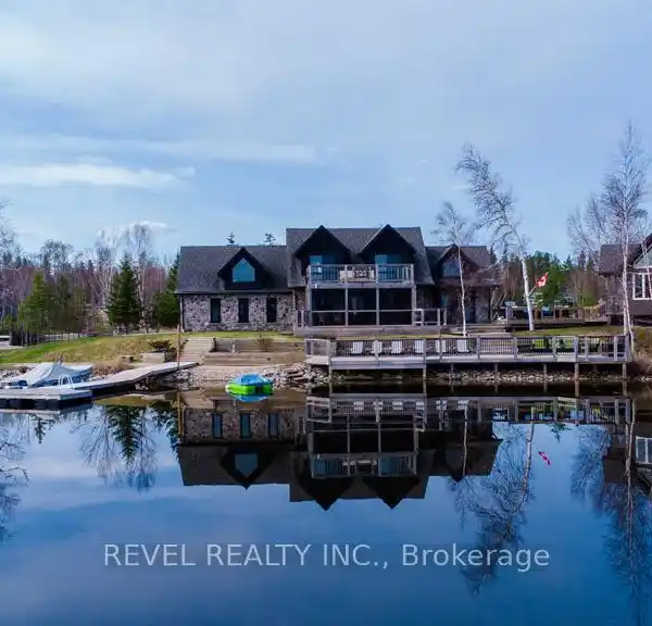 YEAR-ROUND ISLAND SANCTUARY WITH MASSIVE GARAGE