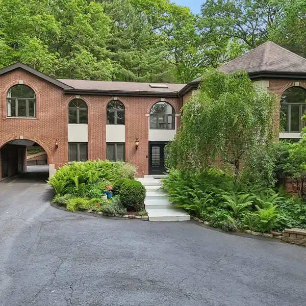 MASSIVE SINGLE FAMILY HOME SURROUNDED BY FOLIAGE