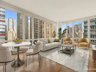 Sophisticated Corner Condo with Floor-To-Ceiling Views