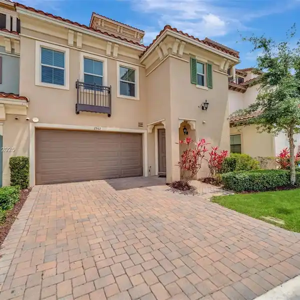 FOUR-STORY CORNER TOWNHOME IN PRESTIGIOUS ARTESIA