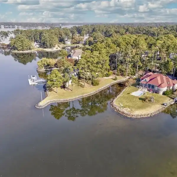 FRENCH NORMAN-STYLE HOME IN A BEAUTIFUL WATERFRONT SETTING