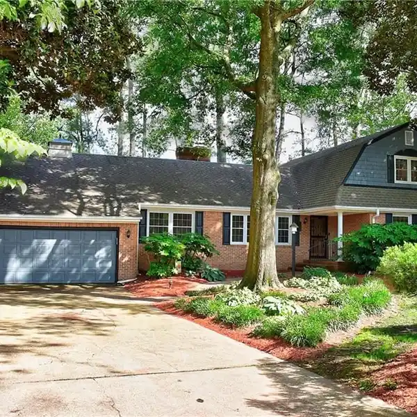 ALL-BRICK HOME ON A SERENE WATERFRONT LOT