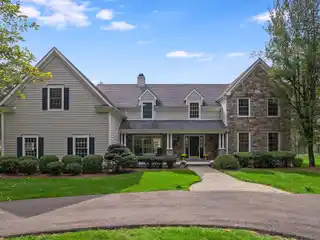 Striking Stone and Cedar Residence