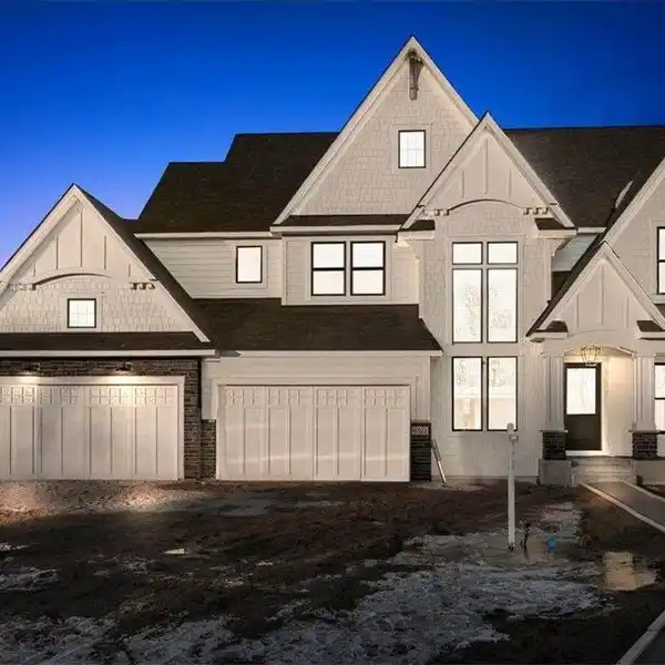 DESIRABLE NEW CONSTRUCTION IN EVANSWOOD OF MAPLE GROVE