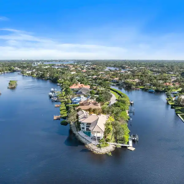 WATERFRONT LIVING IN EXTRAORDINARY CUSTOM ESTATE