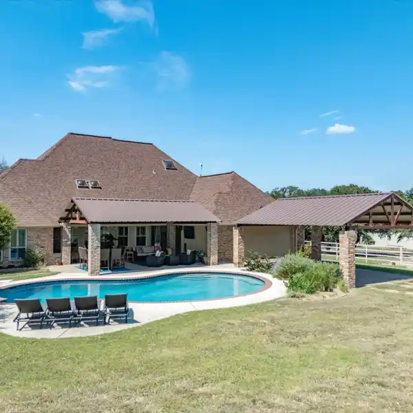 RENOVATED BRICK HOME ON STUNNING 5.8 ACRES