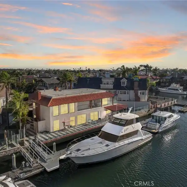LUXURIOUS WATERFRONT LIVING ON A RARE TRIPLE LOT