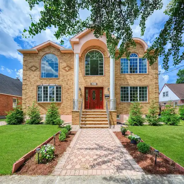 GRAND BRICK HOME WITH ELEGANT MODERN UPDATES