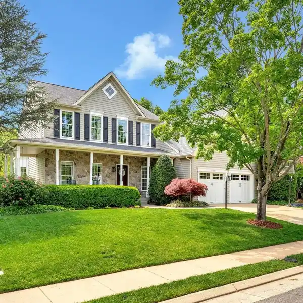 ELEGANT COLONIAL WITH SPACIOUS DECK AND YARD