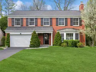 Beautifully Maintained Red Brick Home