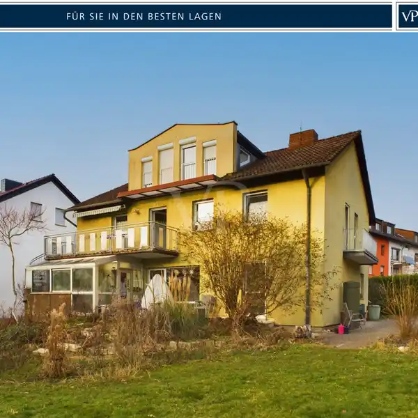 SPACIOUS APARTMENT BUILDING WITH EXTENSIVE GROUNDS