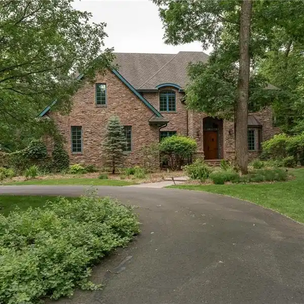 CHARMING HOME ON A FIVE-PLUS-ACRE WOODED LOT