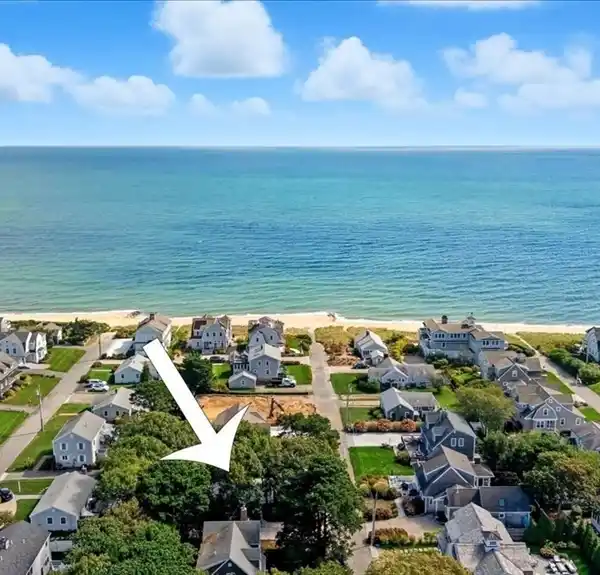 TIMELESS COASTAL CHARM STEPS FROM THE SHORE