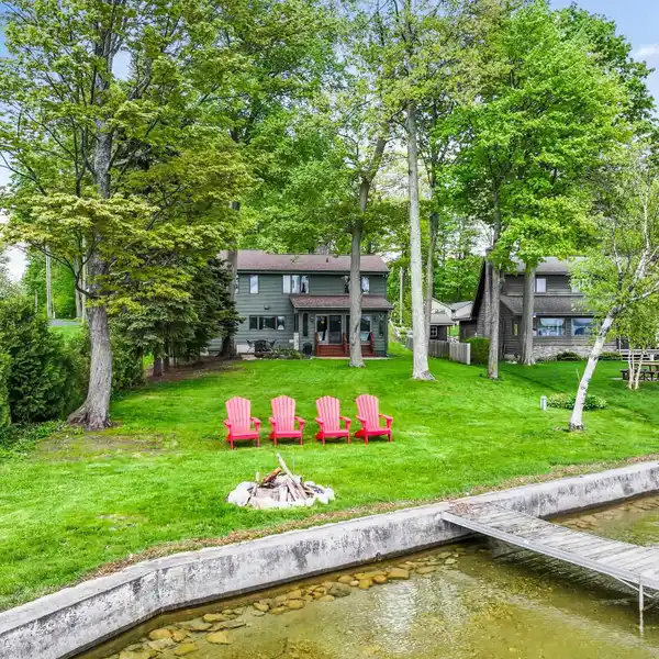 IMMACULATE WATERFRONT HOME WITH SCENIC SUNROOM