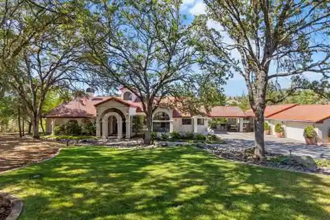 Spanish-Style Estate with Pond
