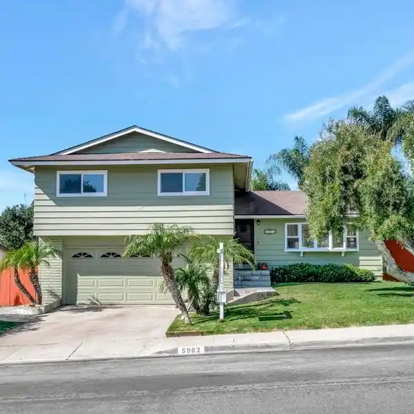 STYLISH SPLIT-LEVEL WITH SPACIOUS YARD AND MODERN UPGRADES