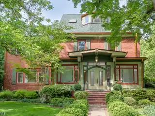 European Colonial Luxury on Park-like Acre