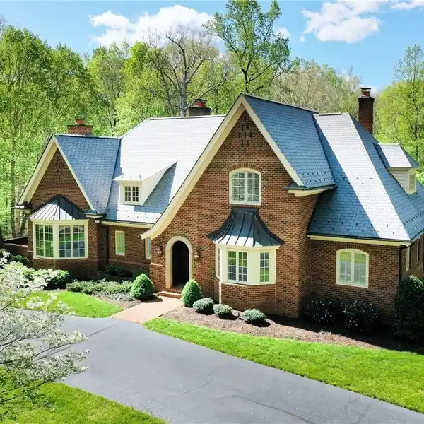 LUXURIOUS ALL-BRICK HOME WITH STUNNING OUTDOOR OASIS