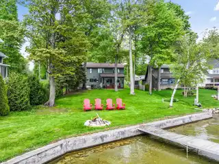 Immaculate Waterfront Home with Scenic Sunroom