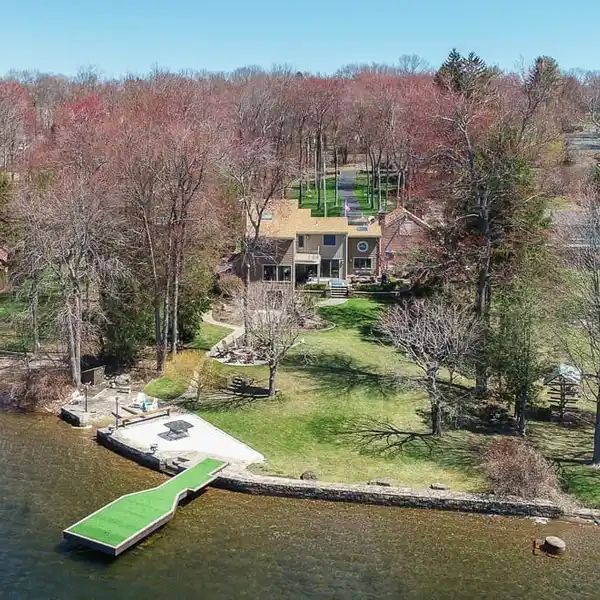 EXCEPTIONAL WATERFRONT LIVING ON PRIVATE CEDAR LAKE