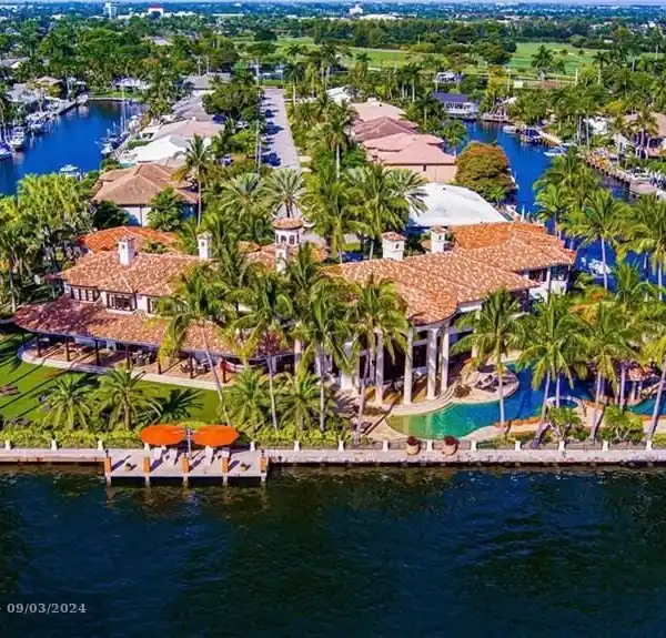GATED PALATIAL PALM BEACH-INSPIRED POINT ESTATE