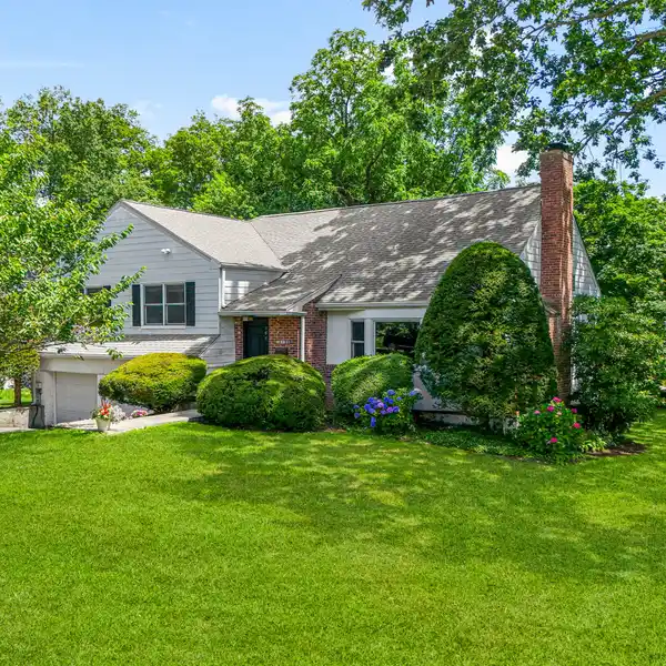 SPACIOUS SPLIT RANCH OVERLOOKING THE GREEN