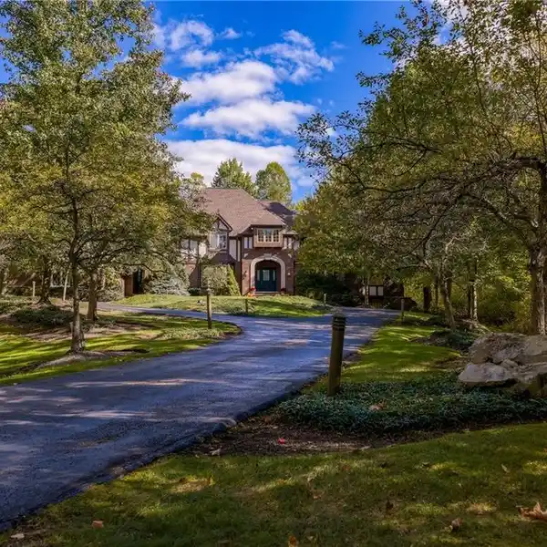 STORYBOOK TUDOR ESTATE WITH GRAND ENTERTAINING SPACES