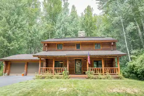Elegant Log Home Along the Bigwood River