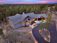 ARCHITECTURAL STUNNER PROMOTES ARTISTRY OF LIVING IN CATHEDRAL PINES