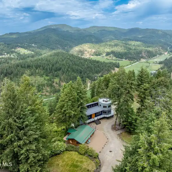 MODERN RETREAT ON 20 ACRES