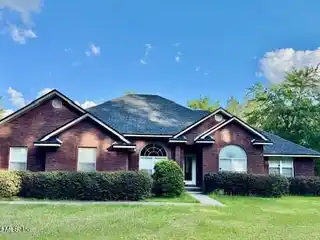 Meticulously Maintained Single-story Brick Home on 20 Acres