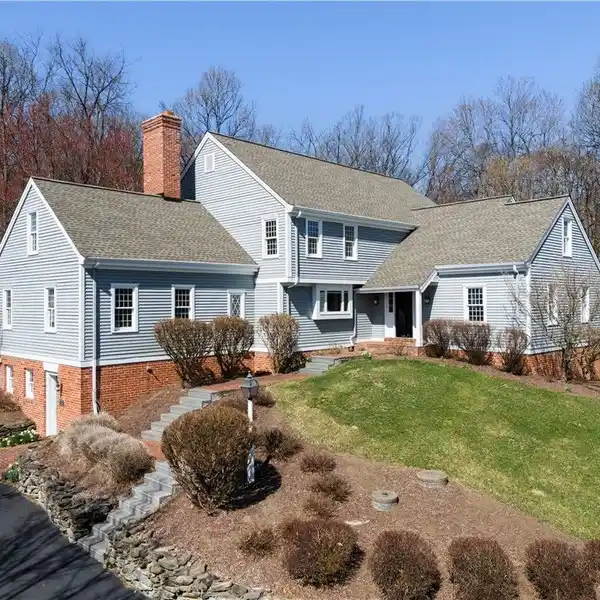 GORGEOUS COLONIAL HOME ON NEARLY THREE ACRES