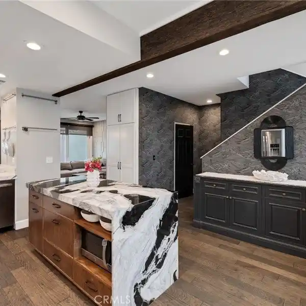 EXTENSIVELY RENOVATED TOWNHOME BLOCKS FROM THE SAND