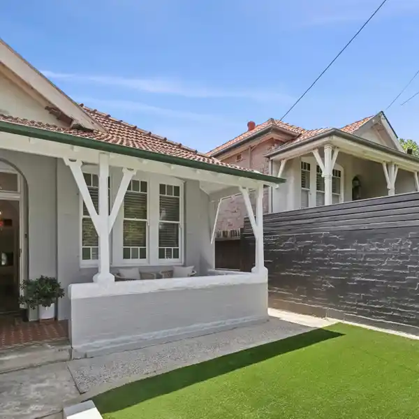 CHARMING BRICK SEMI WITH PRIVATE COURTYARD